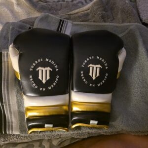 Used But In Very Good Condition. 16 oz Black White TM Boxing Gloves. Made In USA